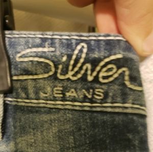 Womans silver jeans size 30